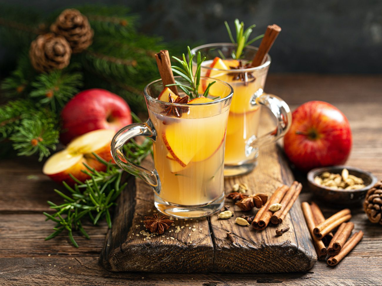Baked apple punch with cinnamon sticks