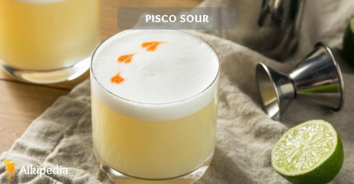 Pisco sour with foam and lime