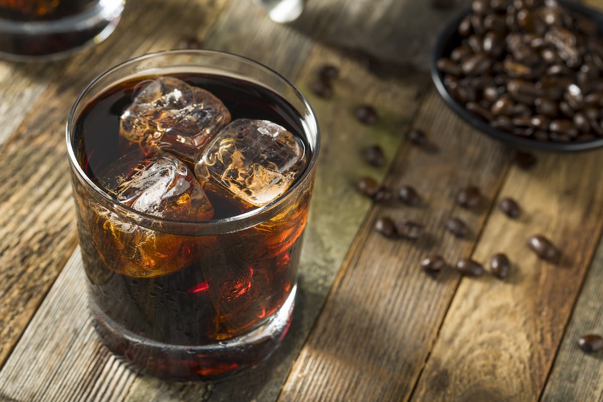 Black russian cocktail with coffee beans